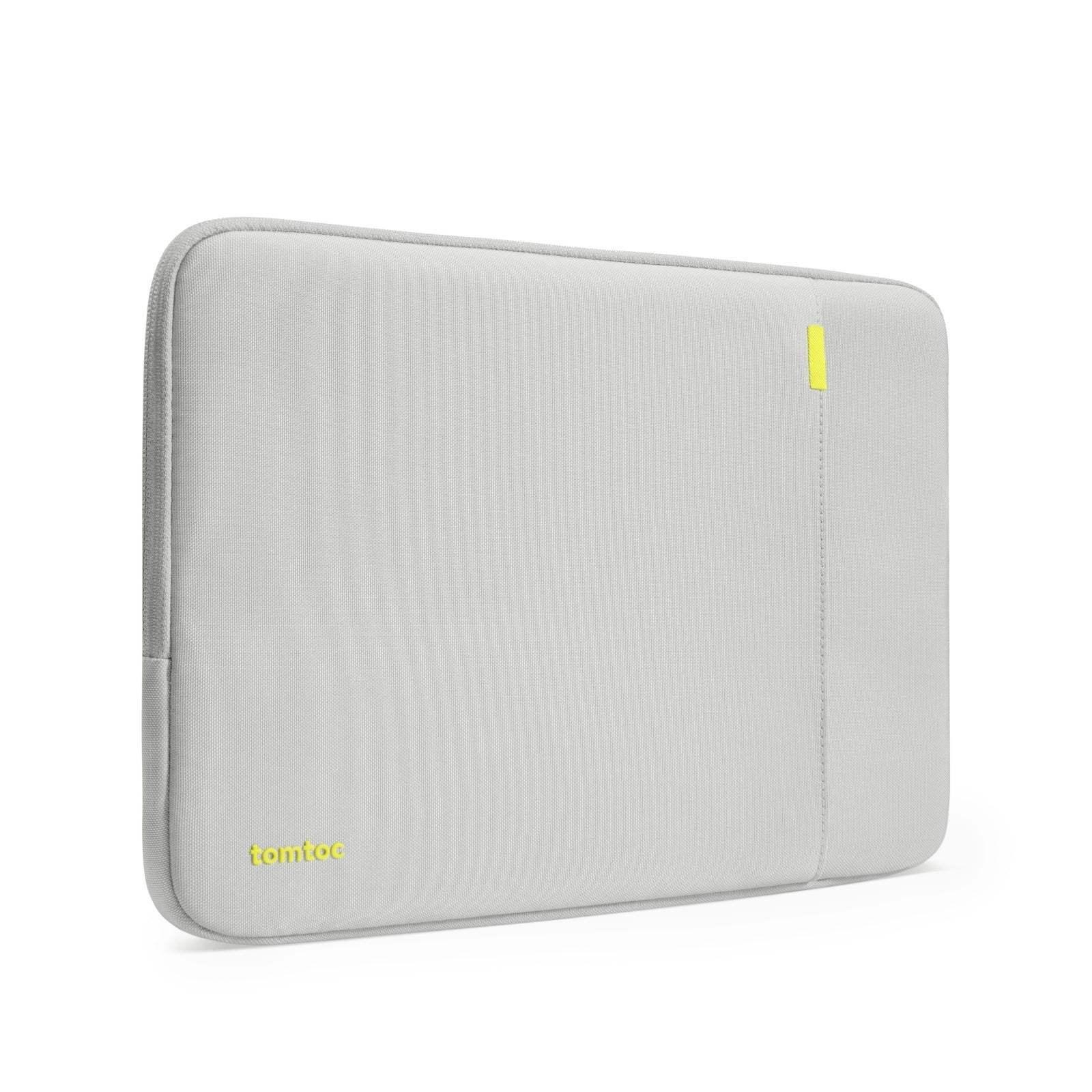 Szara etui na laptopa z zamkiem, minimalistyczny design, ochrona laptopa, akcesoria biurowe