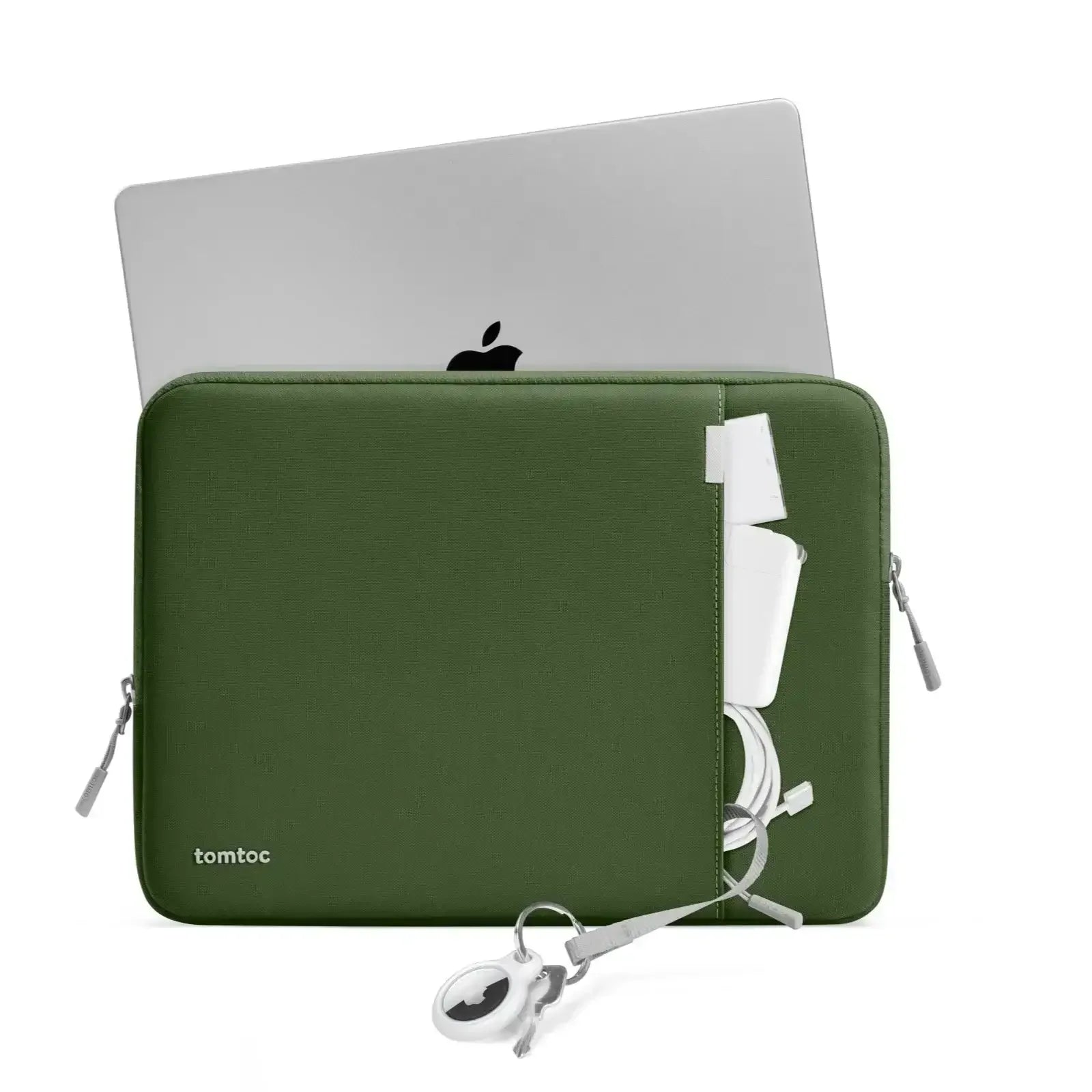 Zielona torba na laptopa z kieszenią na akcesoria, ładowarka i klucz do home office.
