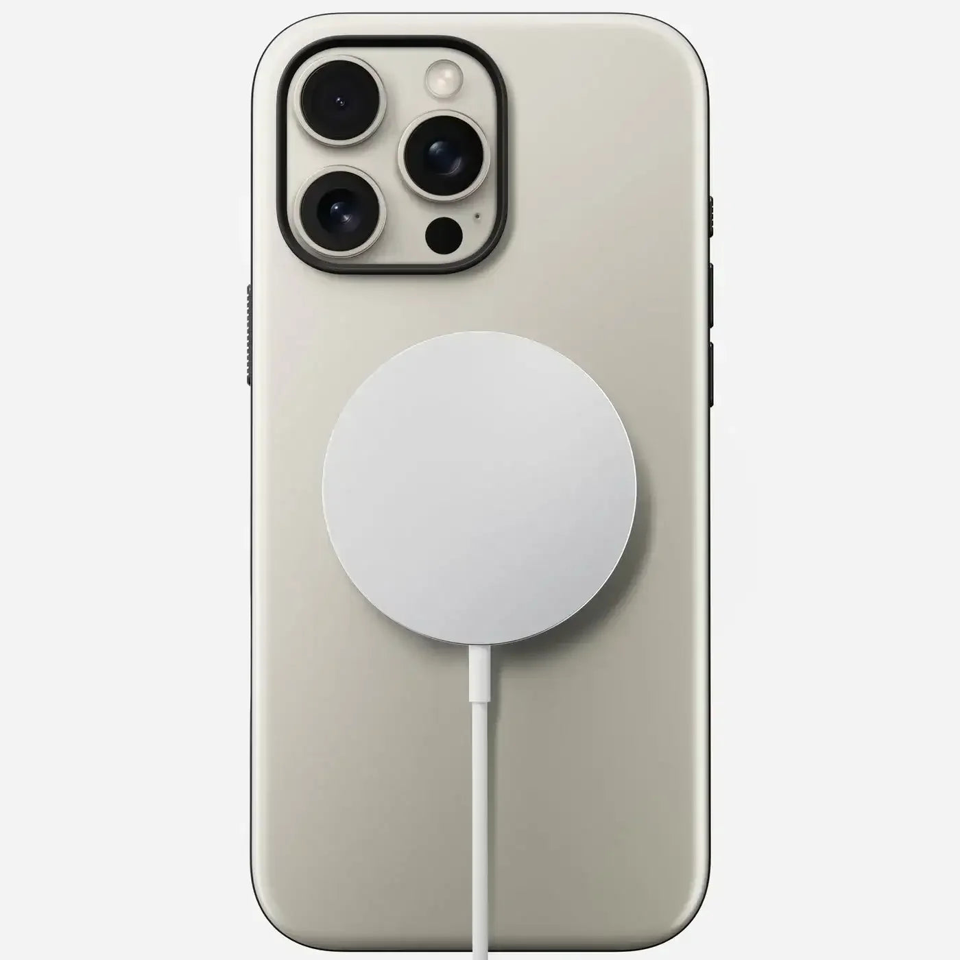 Bezprzewodowa ładowarka MagSafe podłączona do tylnej części smartfona