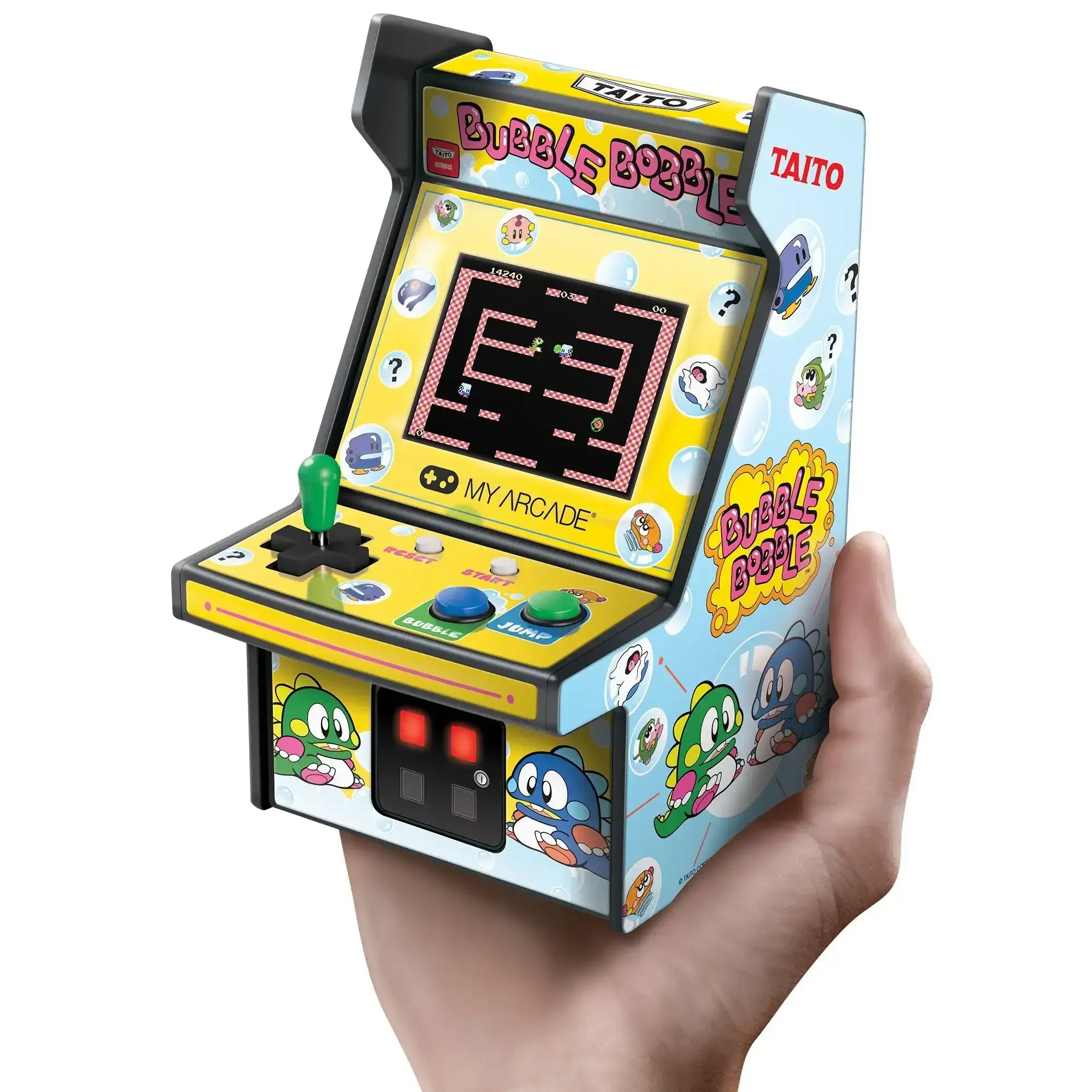 Miniaturowa konsola arcade Bubble Bobble trzymana w dłoni, kolorowa obudowa z joystickiem
