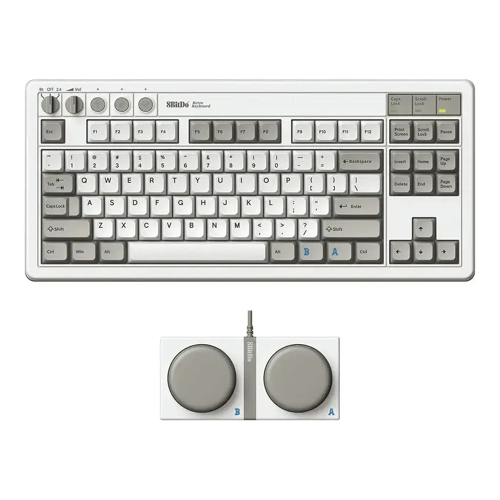 mechaniczna klawiatura retro w kolorze szarym z dużymi pokrętłami i panel sterujący, akcesorium do biura