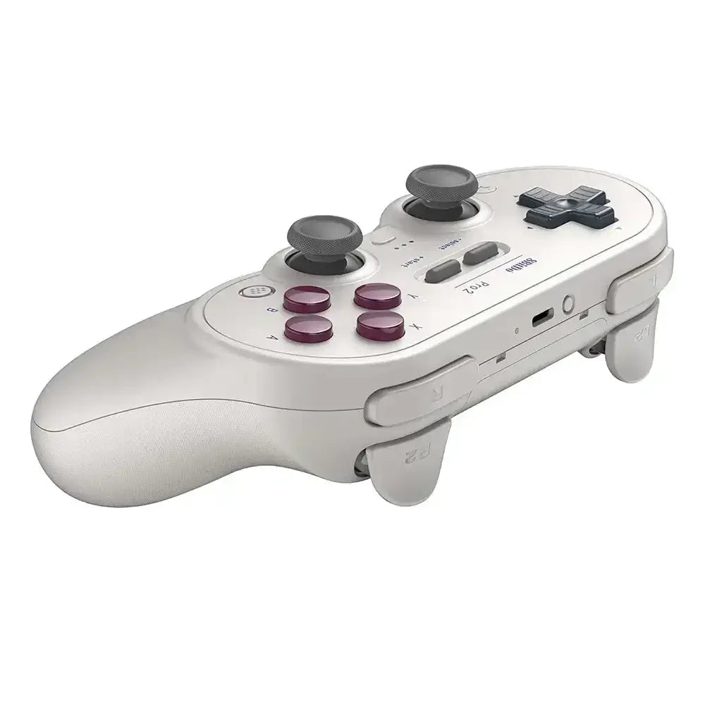 Biały kontroler bezprzewodowy z joystickami i przyciskami do gier komputerowych