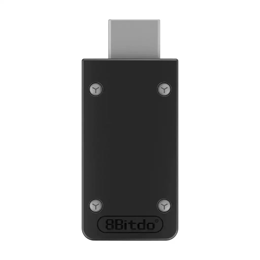 Czarny adapter Retro Receiver USB typu dongle do NES SNES Mini, widok z góry.