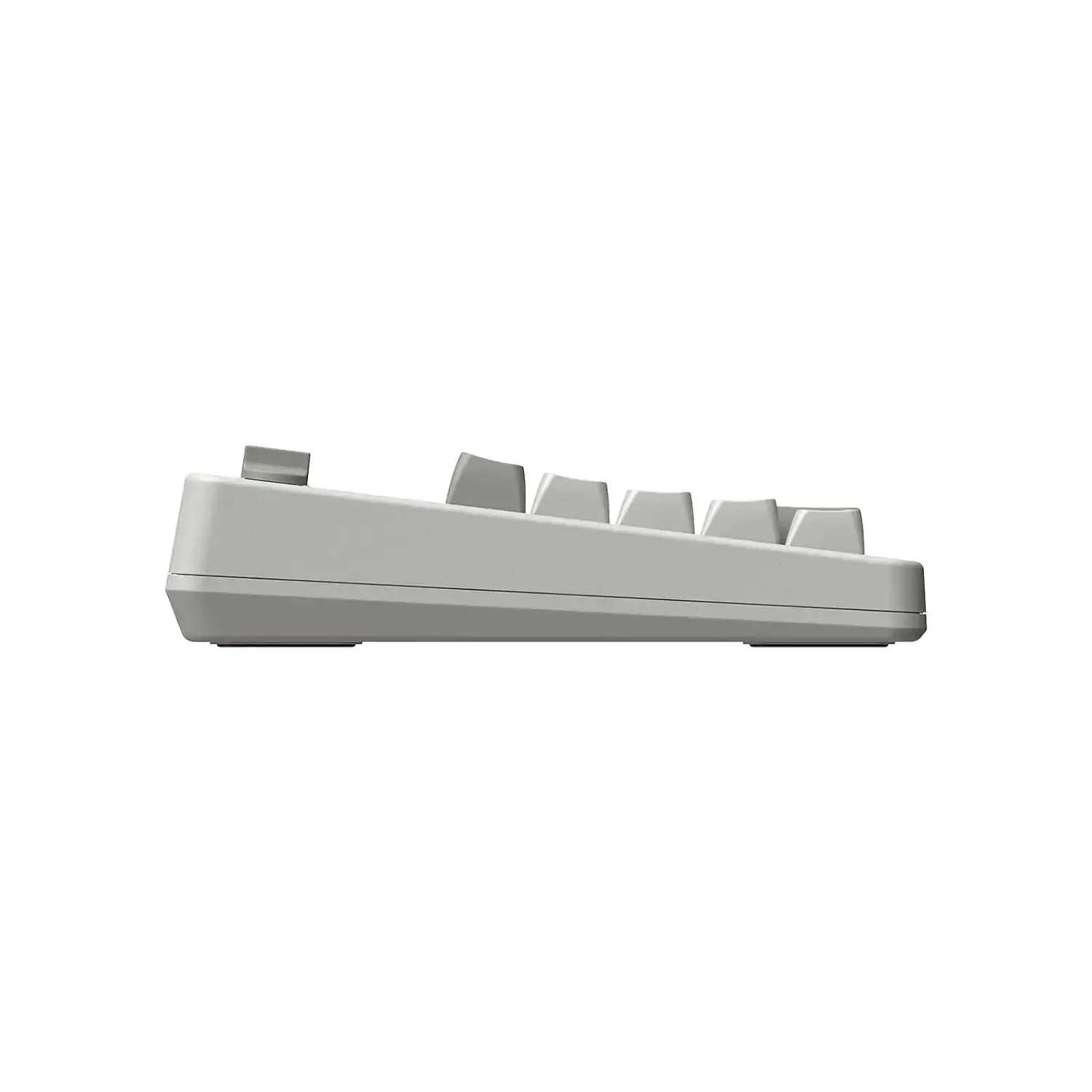 Boczny widok mechanicznego numpada retro do biura, minimalistyczny design, kolor biały.