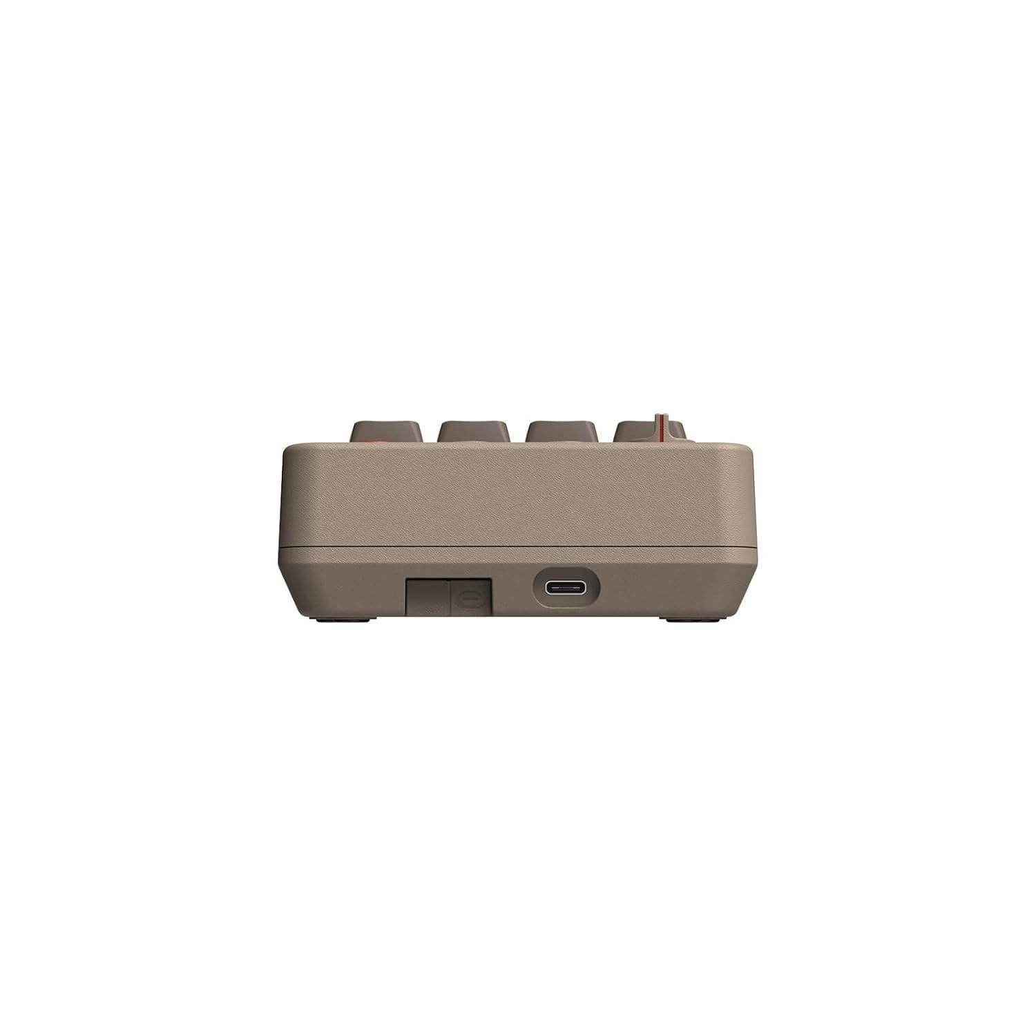 Brązowy numpad mechaniczny retro z portem USB-C, widok z boku