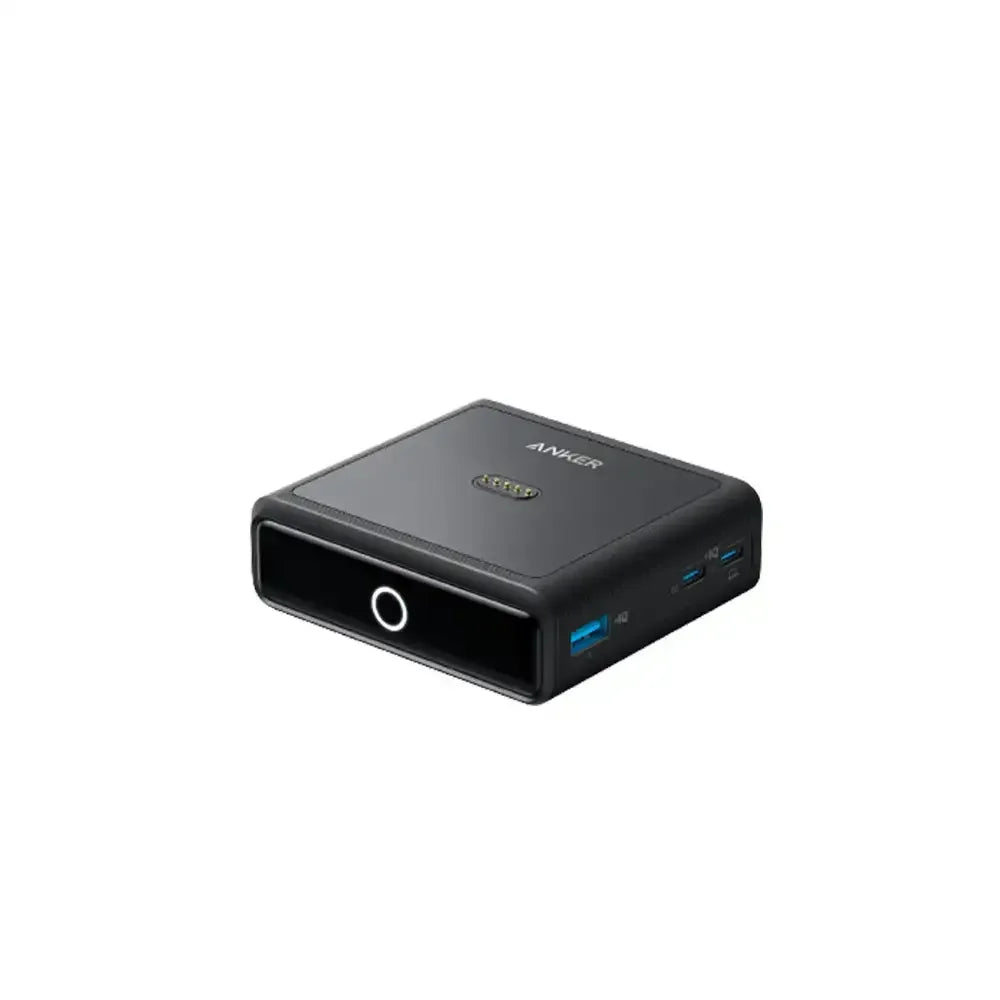 Czarna ładowarka biurkowa z portami USB, akcesorium do home office na białym tle.