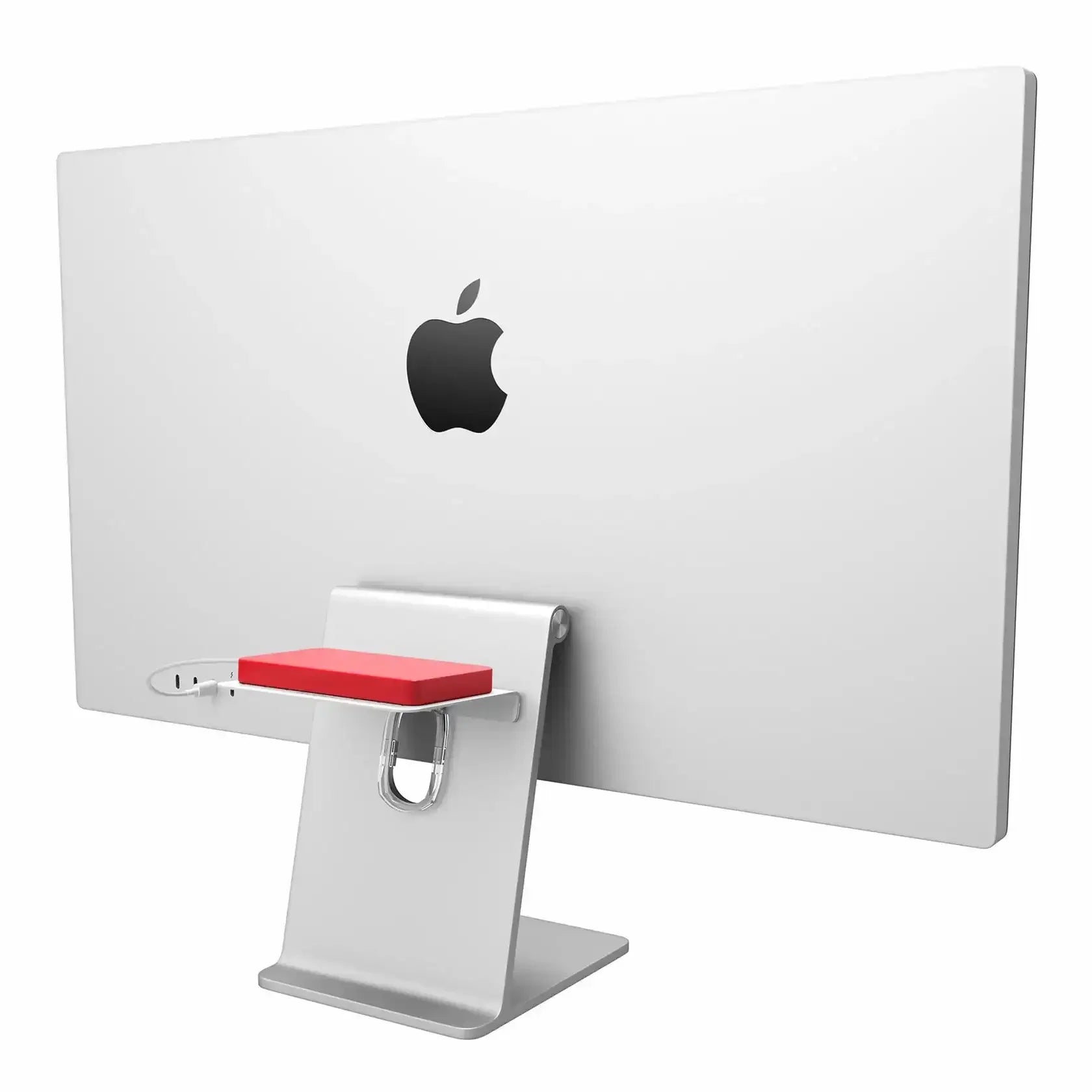 Uchwyt na akcesoria biurowe zamocowany na tylnej stronie monitora Apple, czerwony organizer na stojaku.