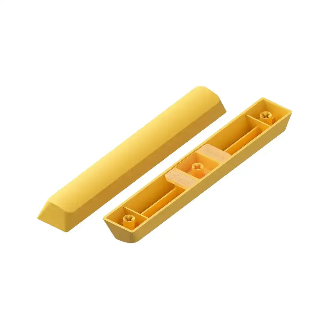 Żółty keycap spacebar do klawiatury mechanicznej, widok z góry i od spodu
