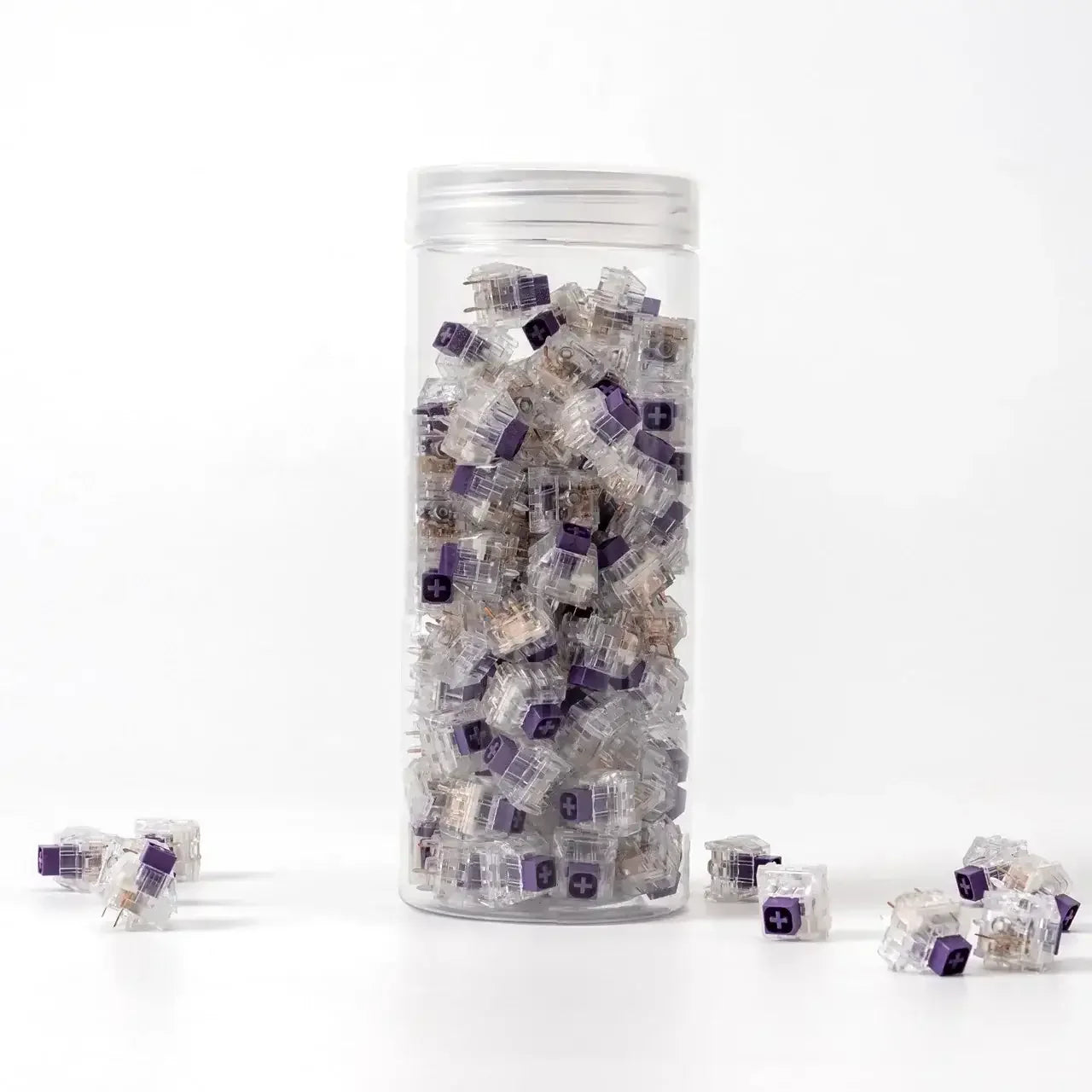 Przezroczyste, mechaniczne switche Kailh Crystal Royal Box w pojemniku na białym tle