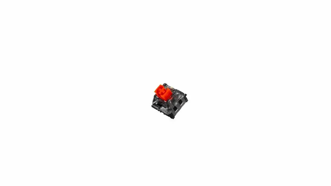 Czerwony switch mechaniczny do klawiatury, przeźroczysta obudowa na białym tle