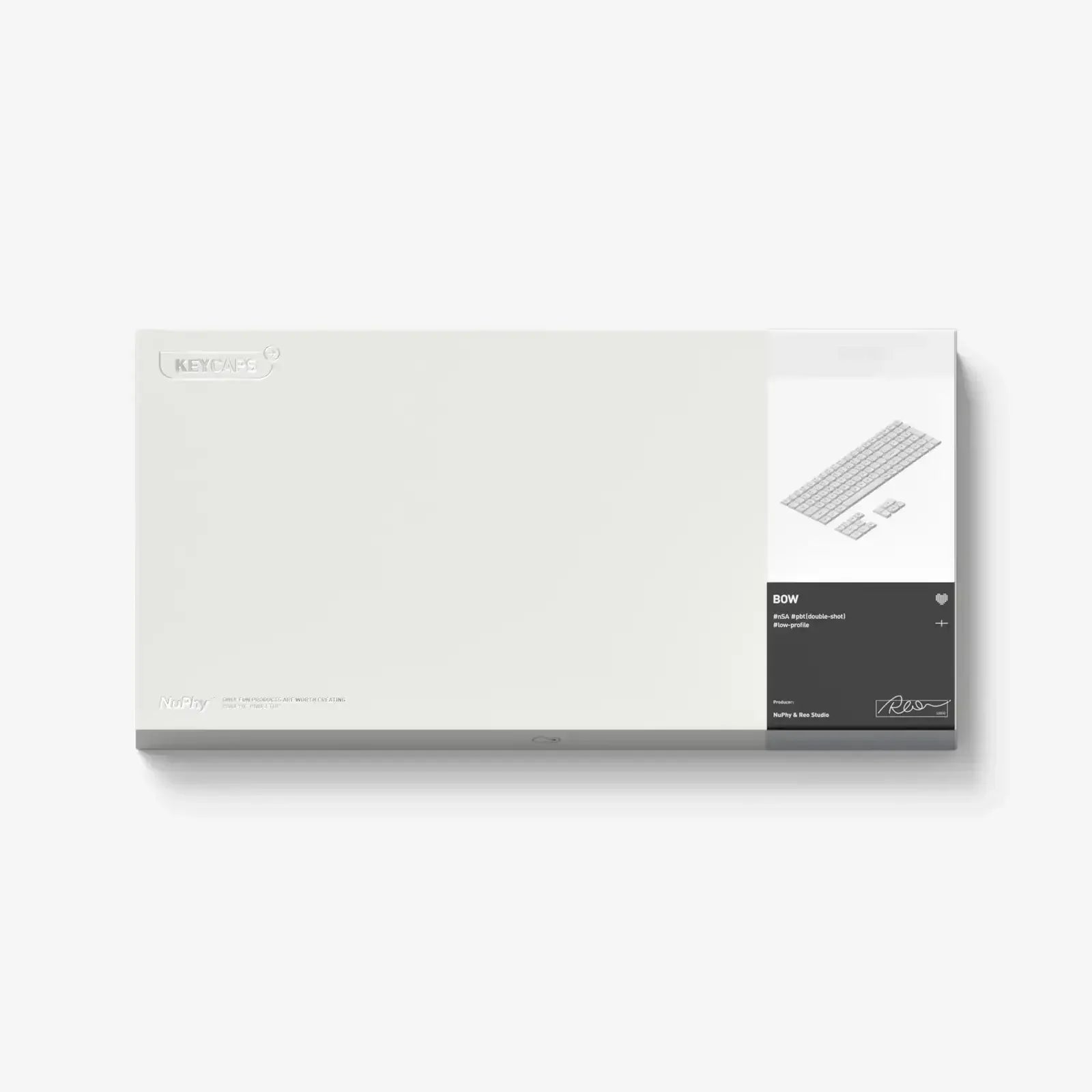 Pudełko zestawu keycapów do klawiatury mechanicznej, profil niskiego profilu, minimalistyczny design.