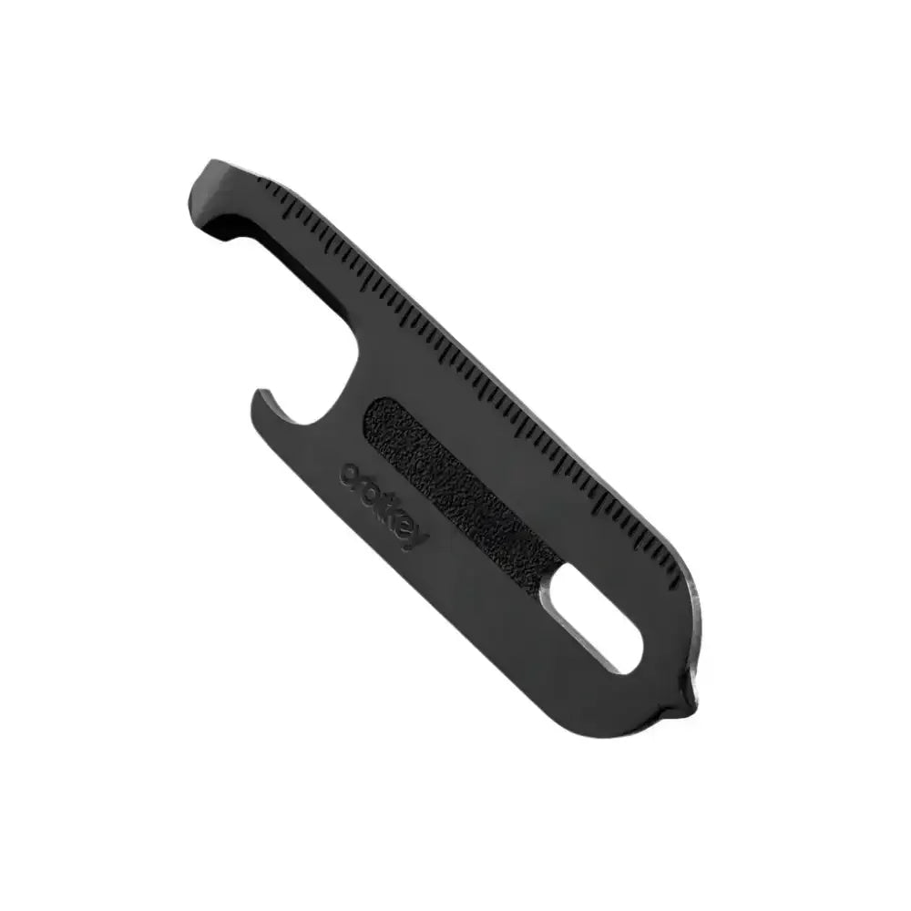 Czarny multitool biurowy z otwieraczem, linijką i wycięciem na klucze, minimalistyczny design