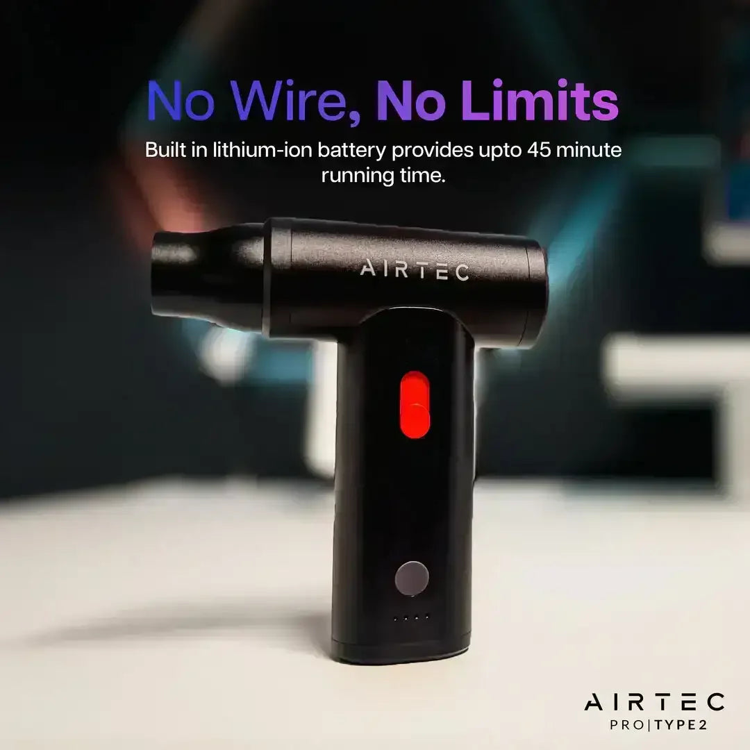 Czarny pistolet bezprzewodowy Airtec z akumulatorem, czerwony przycisk, nowoczesne biuro