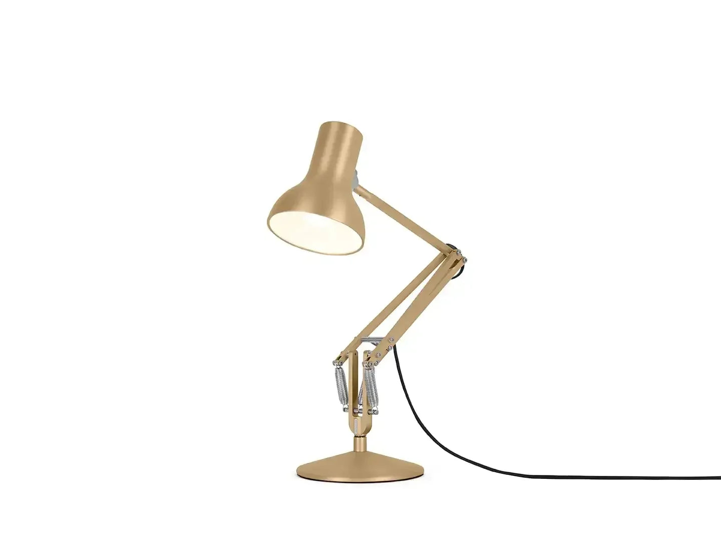 Złota lampa biurkowa z regulowanym ramieniem, idealna do home office i stanowiska pracy.