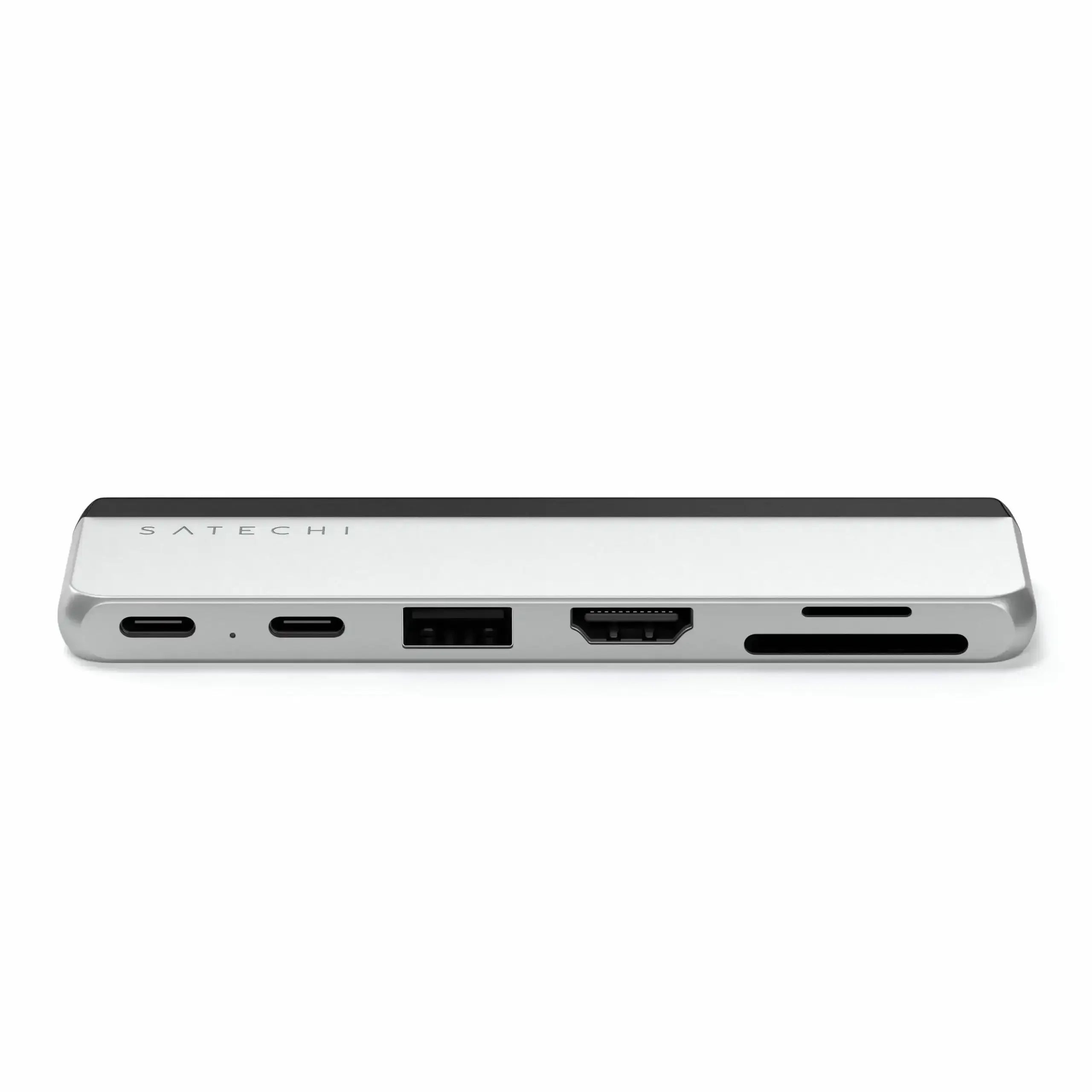 Srebrny hub USB-C z portami USB, HDMI i czytnikiem kart, nowoczesne akcesorium biurowe