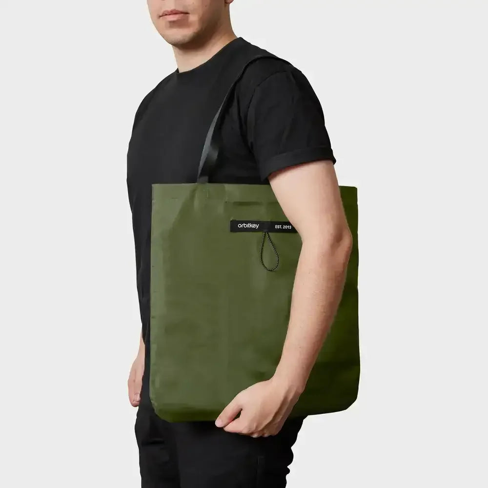 Zielona składana torba na ramię, minimalistyczny design, worek na zakupy.
