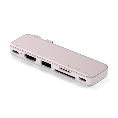 Różowy adapter USB-C z wieloma portami, idealny do setupu biurowego i home office