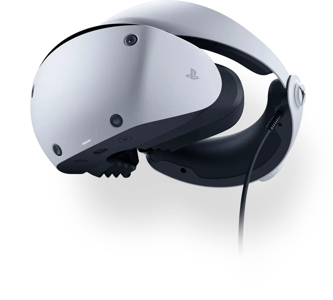 Biała konsola VR PlayStation z czarnymi elementami i przewodem, idealna do gier wirtualnej rzeczywistości.