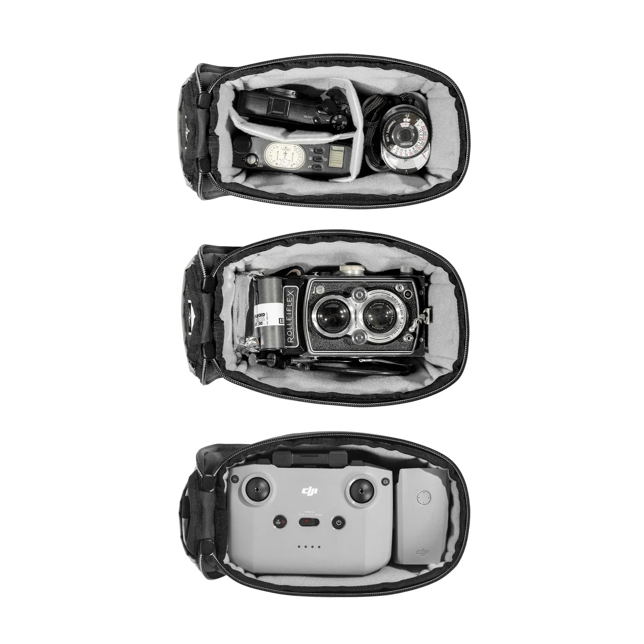 Wnętrze torby na sprzęt fotograficzny z aparatem Rolleiflex, miernikiem światła i pilotem DJI