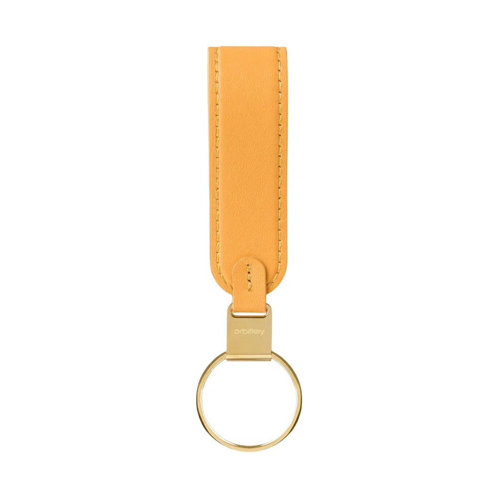 Żółty skórzany brelok Orbitkey z metalowym pierścieniem, idealny do organizacji kluczy w home office