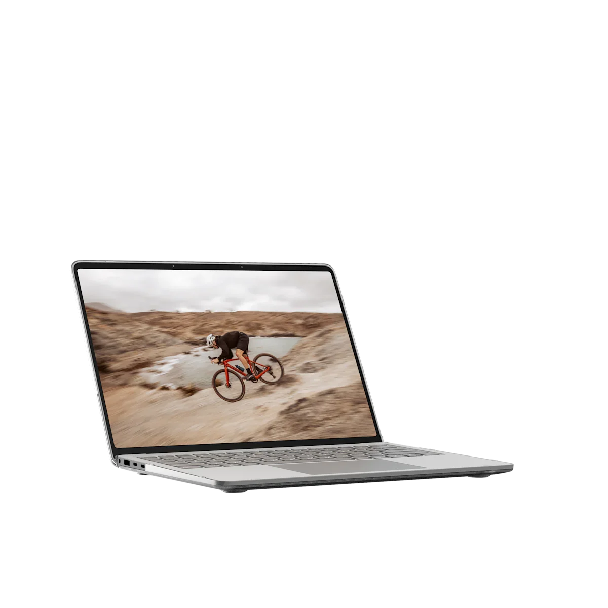 Laptop z ekranem pokazującym rowerzystę na trasie, idealny do home office i pracy zdalnej