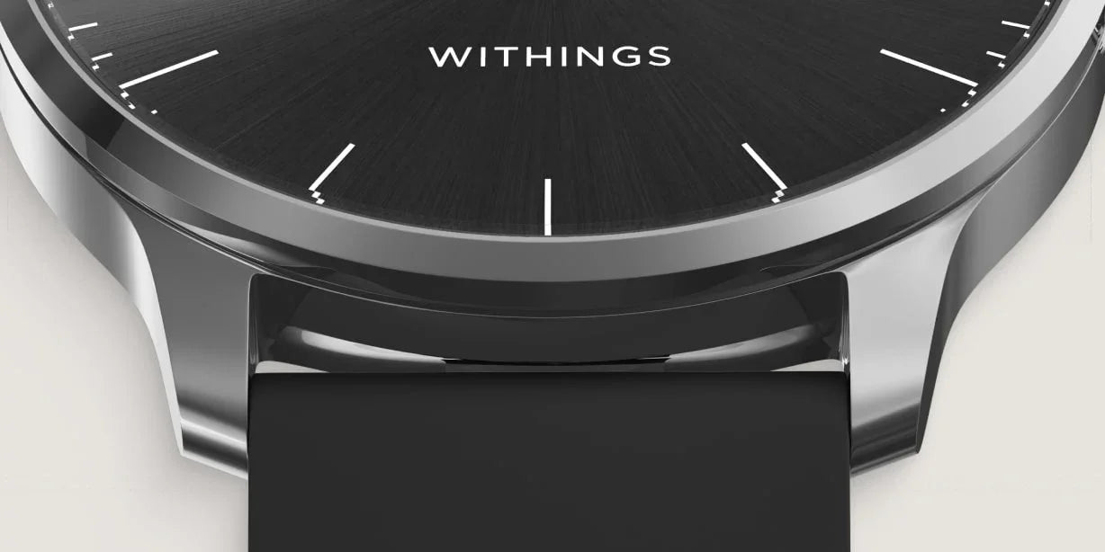 Zegarek Withings z czarną tarczą i srebrną obudową, idealny do home office