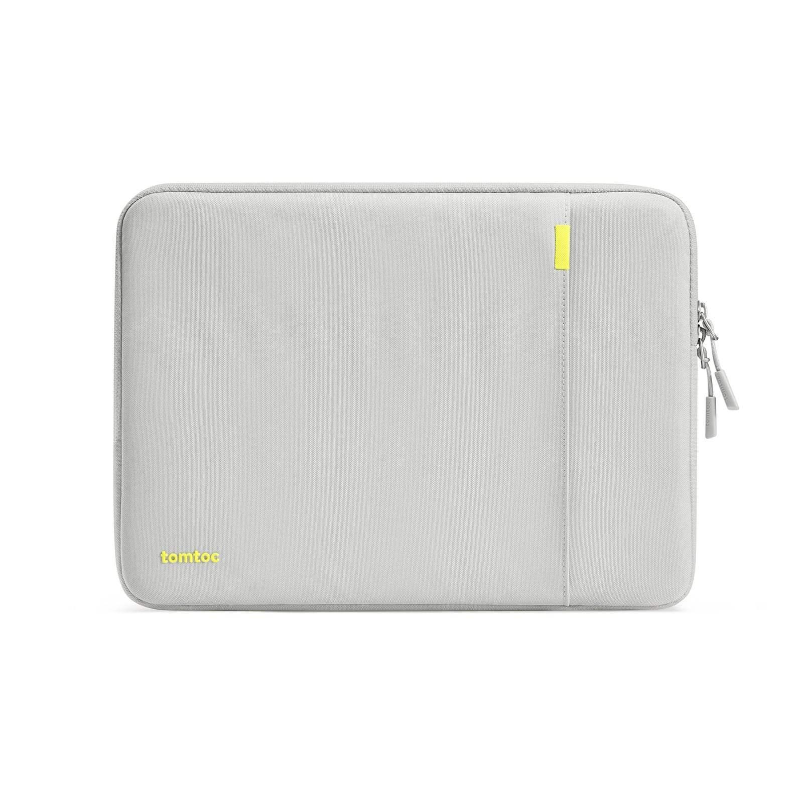 Jasnoszara torba na laptopa z zamkiem błyskawicznym, minimalistyczny design.