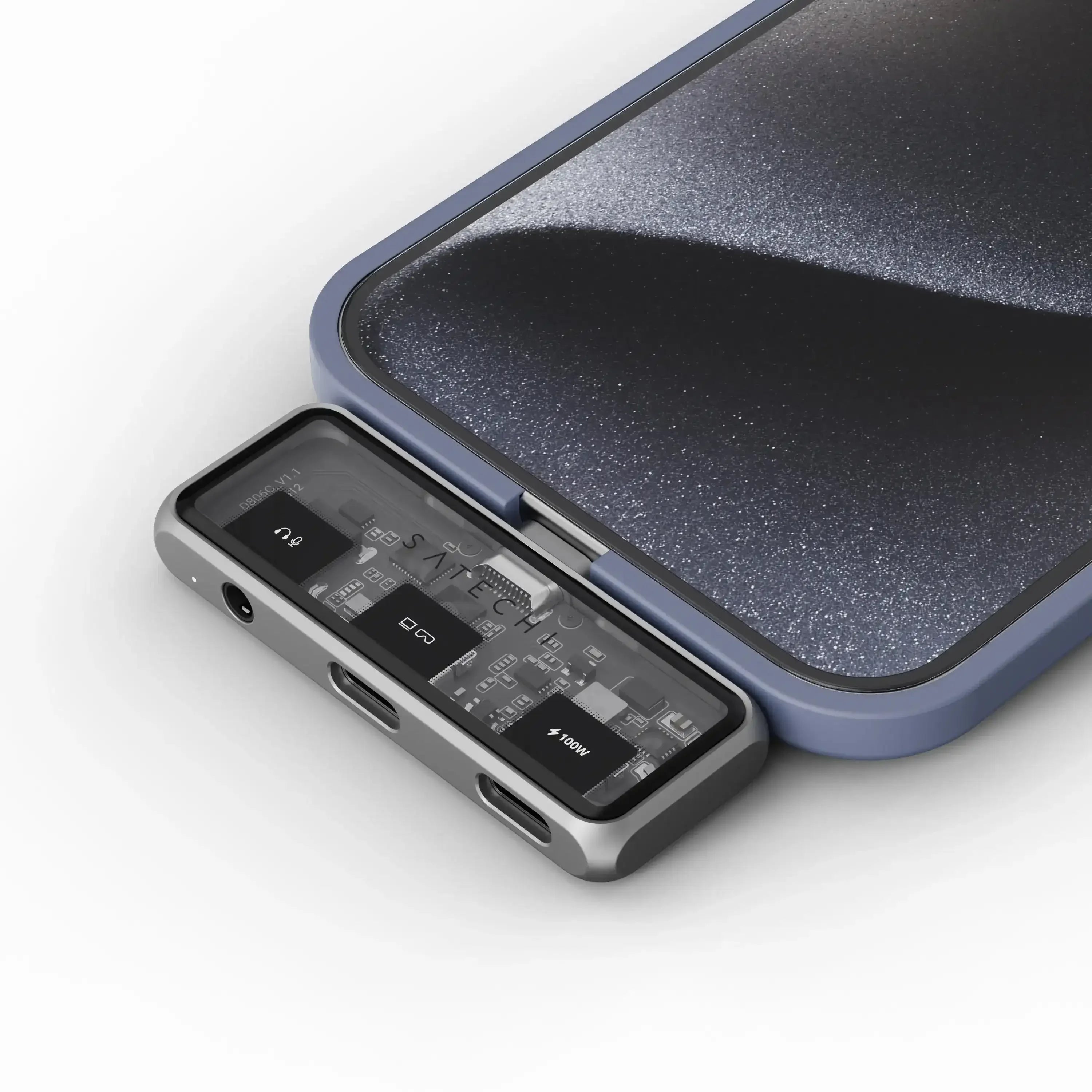 Nowoczesny hub USB-C z wyjściem audio podłączony do smartfona, widoczne porty i podzespoły