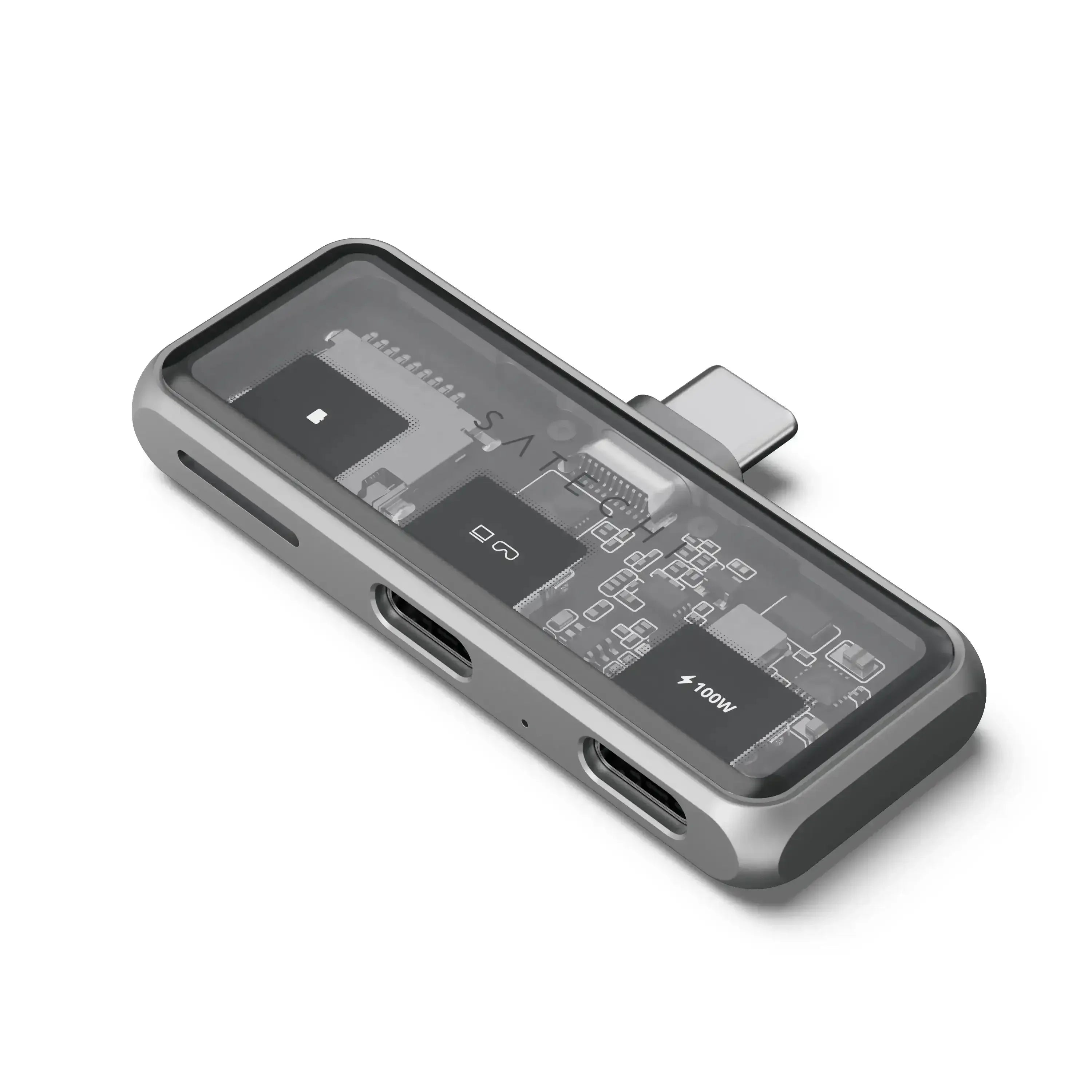 Nowoczesny hub USB-C z portami i slotem na kartę microSD, przezroczysta obudowa, akcesorium biurowe
