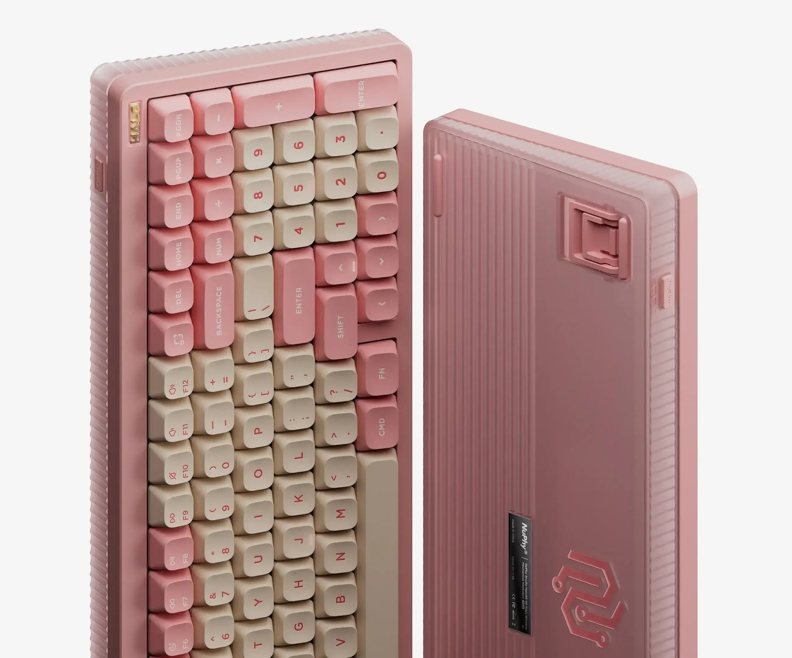 Różowa klawiatura mechaniczna z keycapami w odcieniach różu i beżu, idealna do home office.