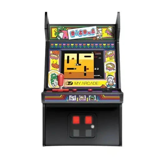 Retro automat arcade z kolorową grafiką i ekranem gry Dig Dug, joystick do sterowania