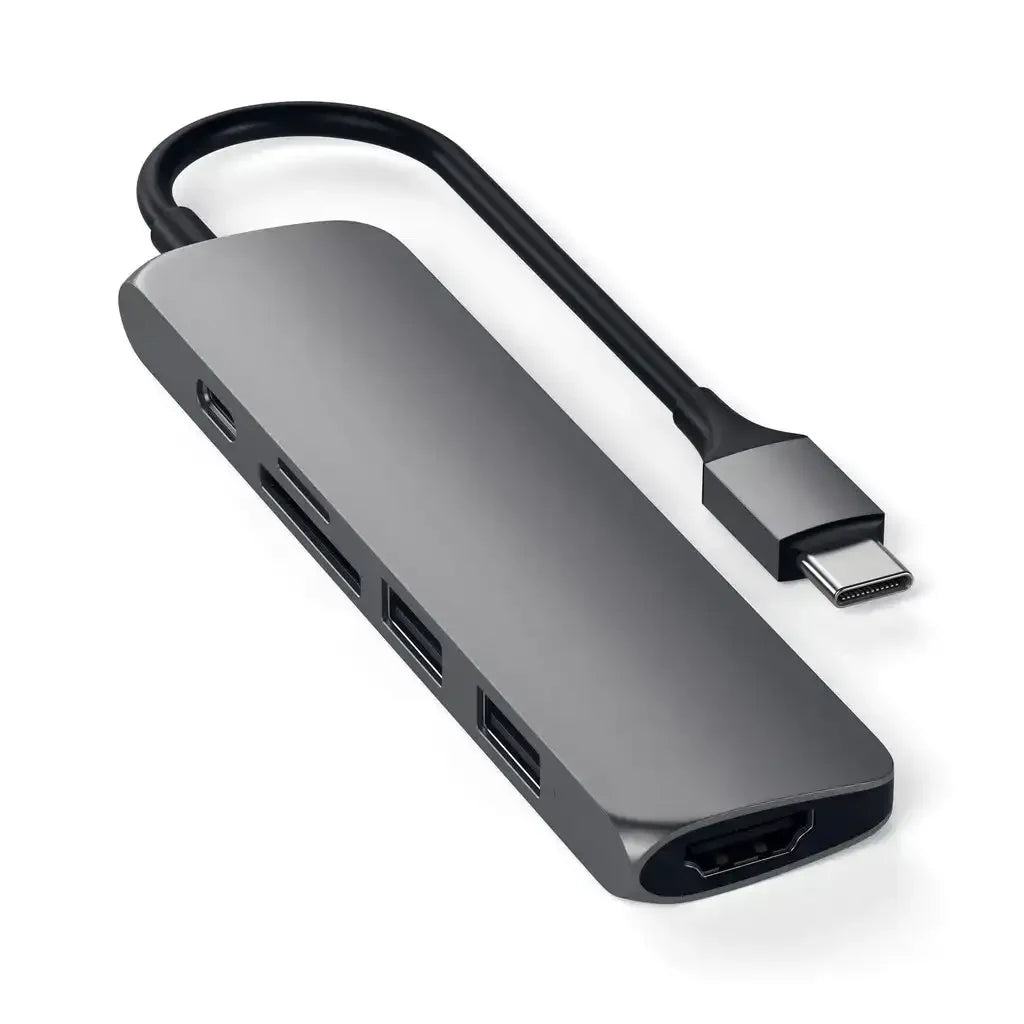 Srebrny aluminiowy hub USB-C z wieloma portami HDMI, USB i czytnikiem kart, akcesorium biurowe