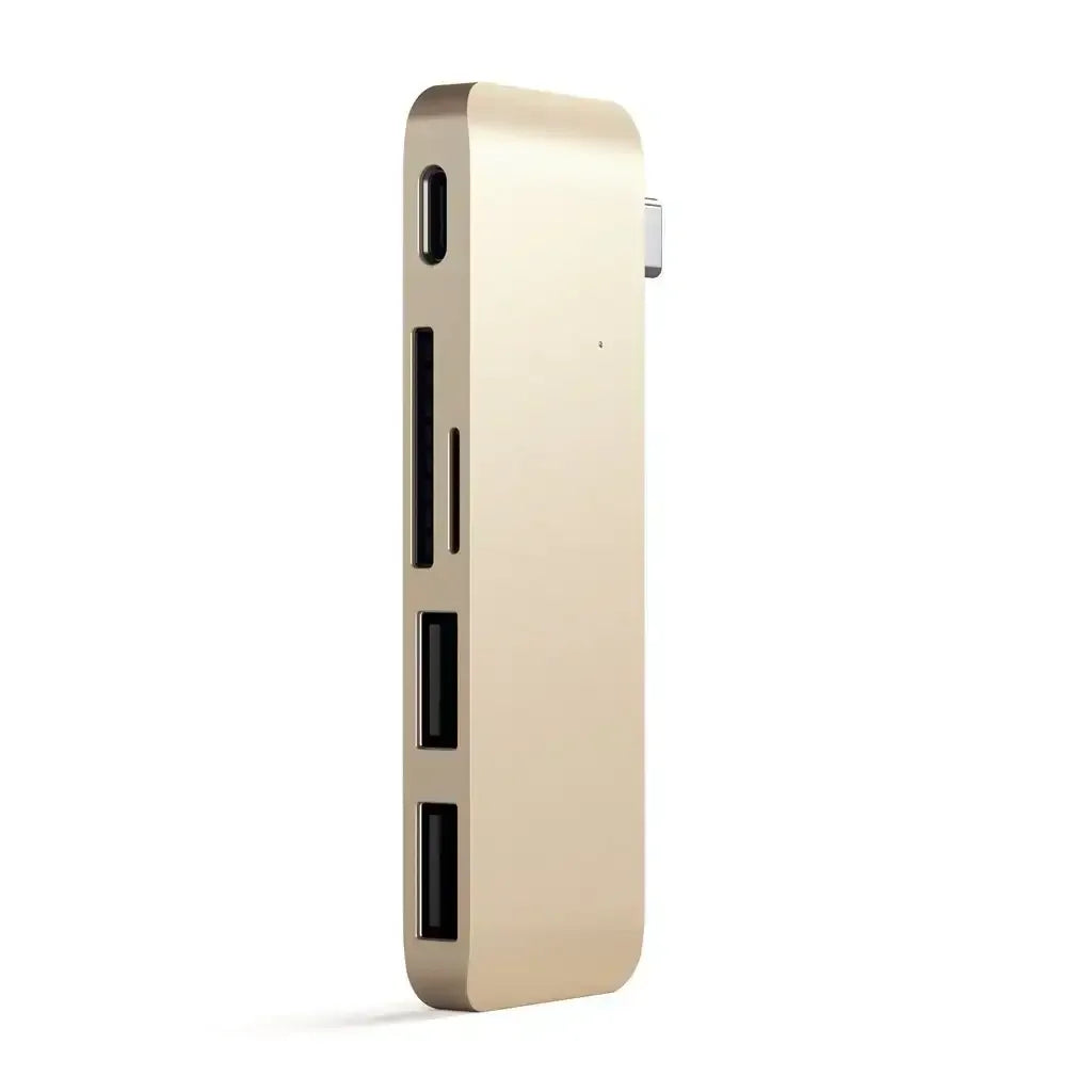 Złoty hub USB-C z wieloma portami, akcesorium do biura i laptopa, widok z boku