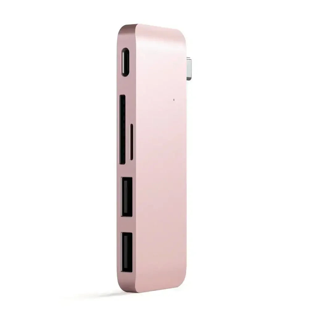 Różowy hub USB typu C z wieloma portami do laptopa, elegancki design, akcesorium biurowe