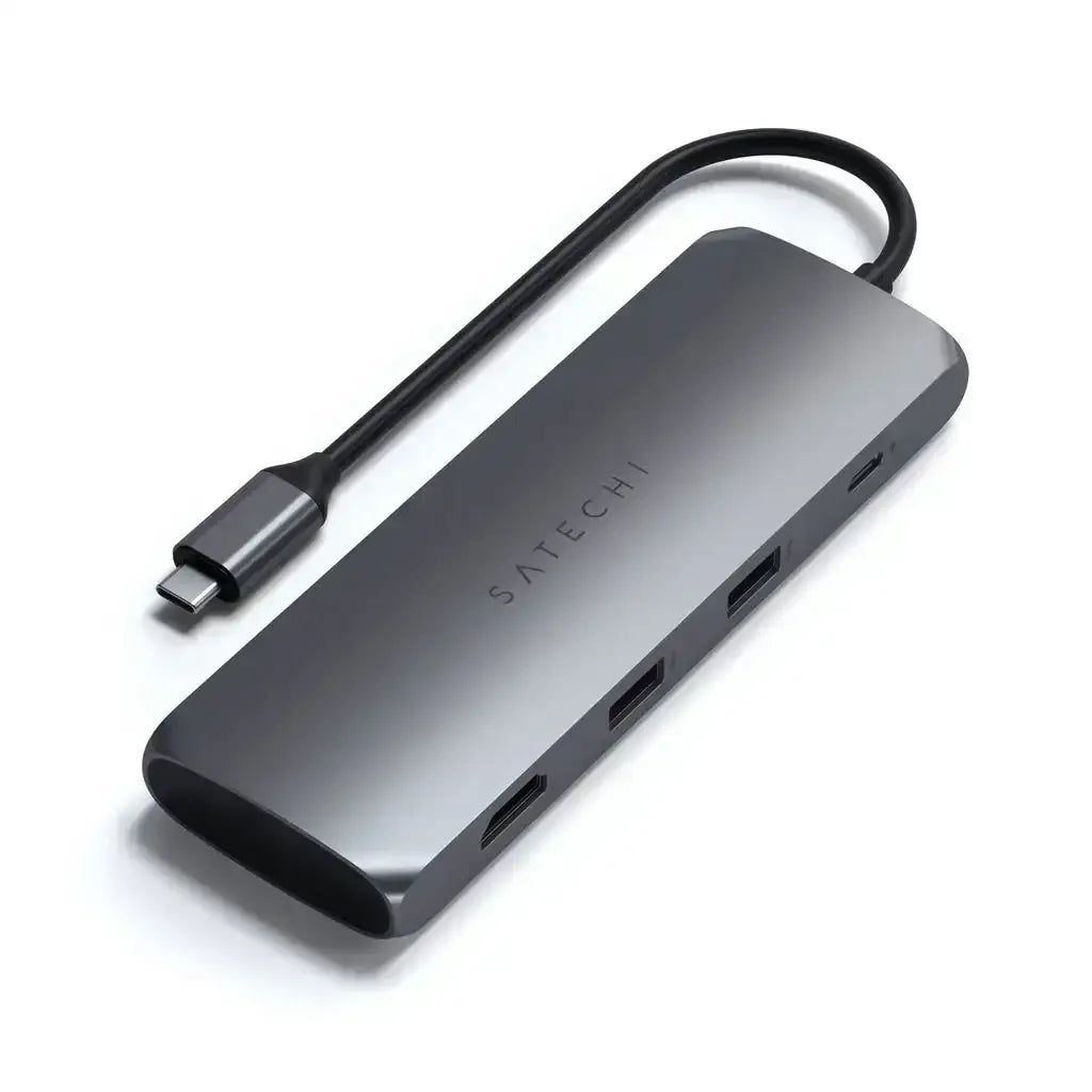 Szary adapter USB-C z wieloma portami, nowoczesny hub biurowy, minimalistyczny design