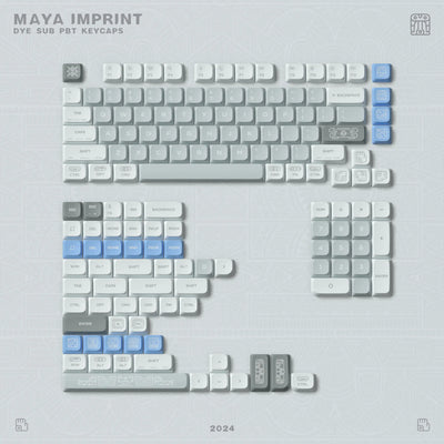 Zestaw keycapów PBT Maya Imprint do klawiatury mechanicznej, białe i niebieskie nasadki z nadrukami.