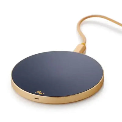 Okrągła, złota ładowarka bezprzewodowa USB na biurko, elegancki design