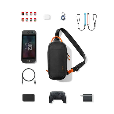 Zestaw akcesoriów do Nintendo Switch: torba, konsola, pady, etui na gry, ładowarka, kabel USB-C.