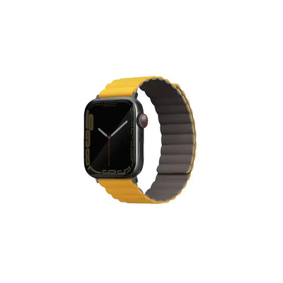 Smartwatch z czarną kopertą i paskiem w kolorze musztardowym, minimalistyczny design