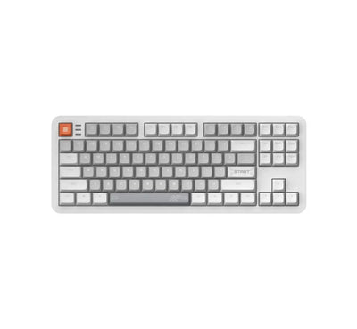 Klawiatura mechaniczna TKL z szarymi i białymi keycapami, pomarańczowy przycisk w rogu