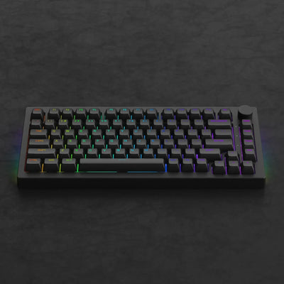 Czarna klawiatura mechaniczna RGB z podświetleniem i pokrętłem na ciemnym tle