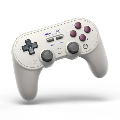 Biały bezprzewodowy gamepad retro z gałkami analogowymi i przyciskami, kontroler do gier