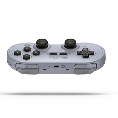 Bezprzewodowy pad do gier retro z joystickami i przyciskami, szary kontroler gamingowy