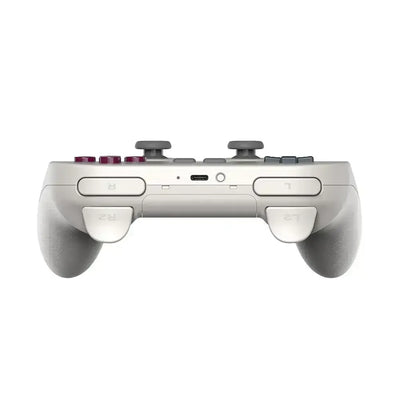 Biały kontroler do gier, widok z góry na przyciski L1, L2, R1, R2 i wejście USB-C.