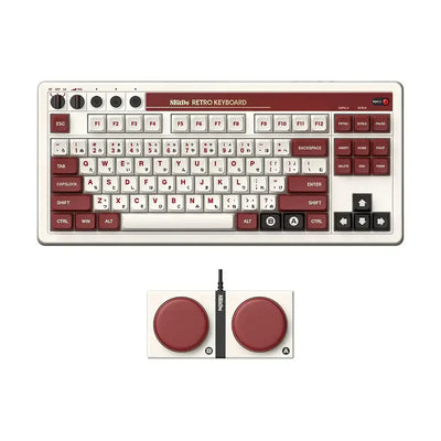 Retro klawiatura mechaniczna 8BitDo z czerwonymi i białymi keycapami oraz dużymi przyciskami.