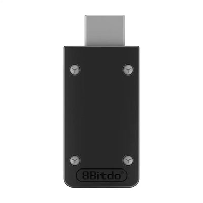 Czarny adapter Retro Receiver USB typu dongle do NES SNES Mini, widok z góry.