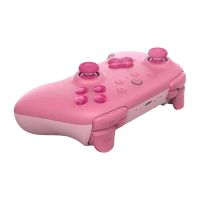 Różowy bezprzewodowy kontroler Bluetooth do gier z dwoma joystickami i przyciskami
