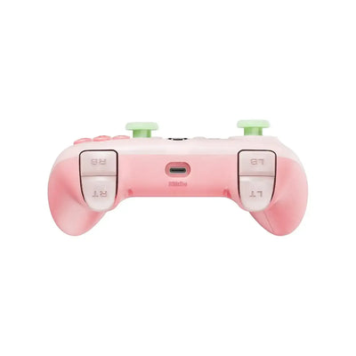 Różowy kontroler przewodowy do Xbox z zielonymi joystickami, widok z tyłu