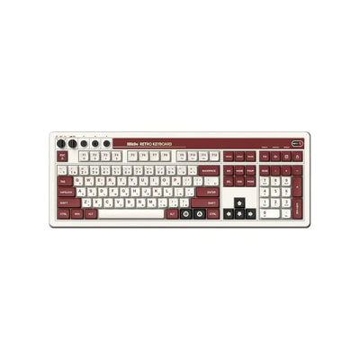 Klawiatura mechaniczna retro 8bitdo w stylu Famicom, biało-bordowa, pełnowymiarowa, keycapy z symbolami.