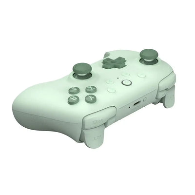 zielony bezprzewodowy kontroler do gier, nowoczesny pad z joystickami i przyciskami XYAB